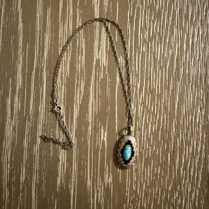 Elegant Silver and Turquoise Pendant Necklace